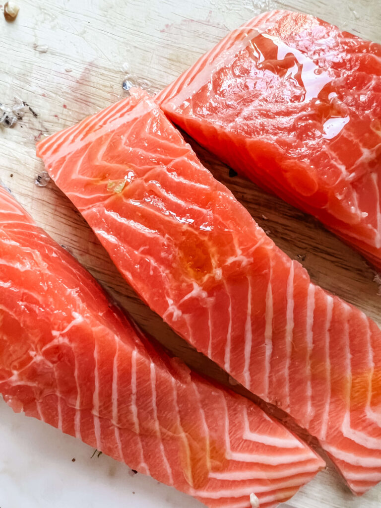 Salmon on a wooden cutting board