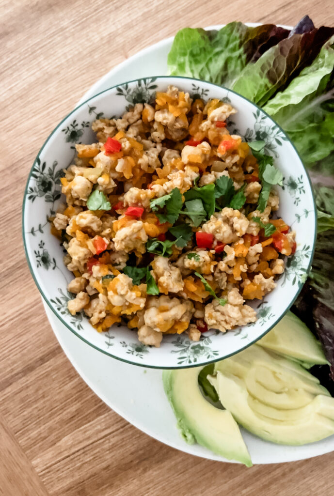  A bowl of ground beef and veggies on a plate